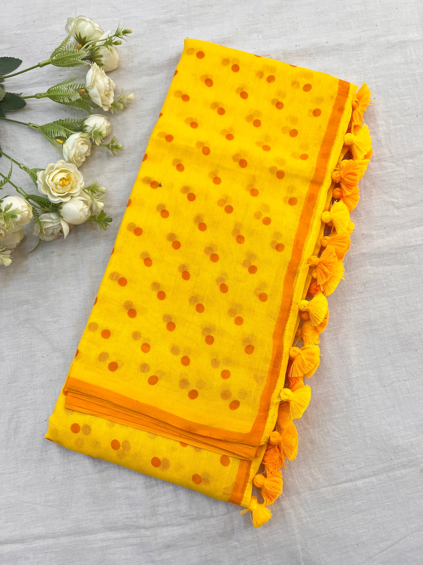 Yellow Orange Dotted Mulmul Saree