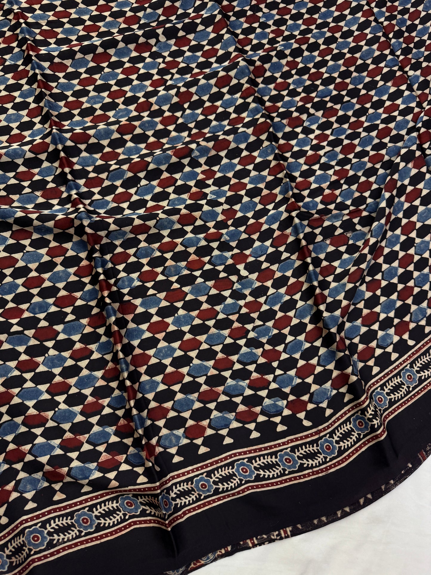 Kaali Kairi Ajrakh Modal Silk Saree