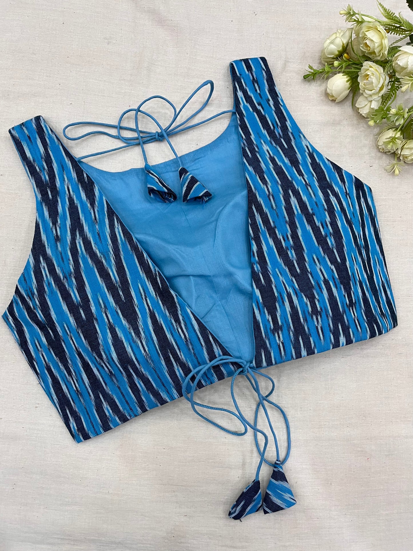 Sky Blue Ikkat Boat Neck Sleeveless Blouse