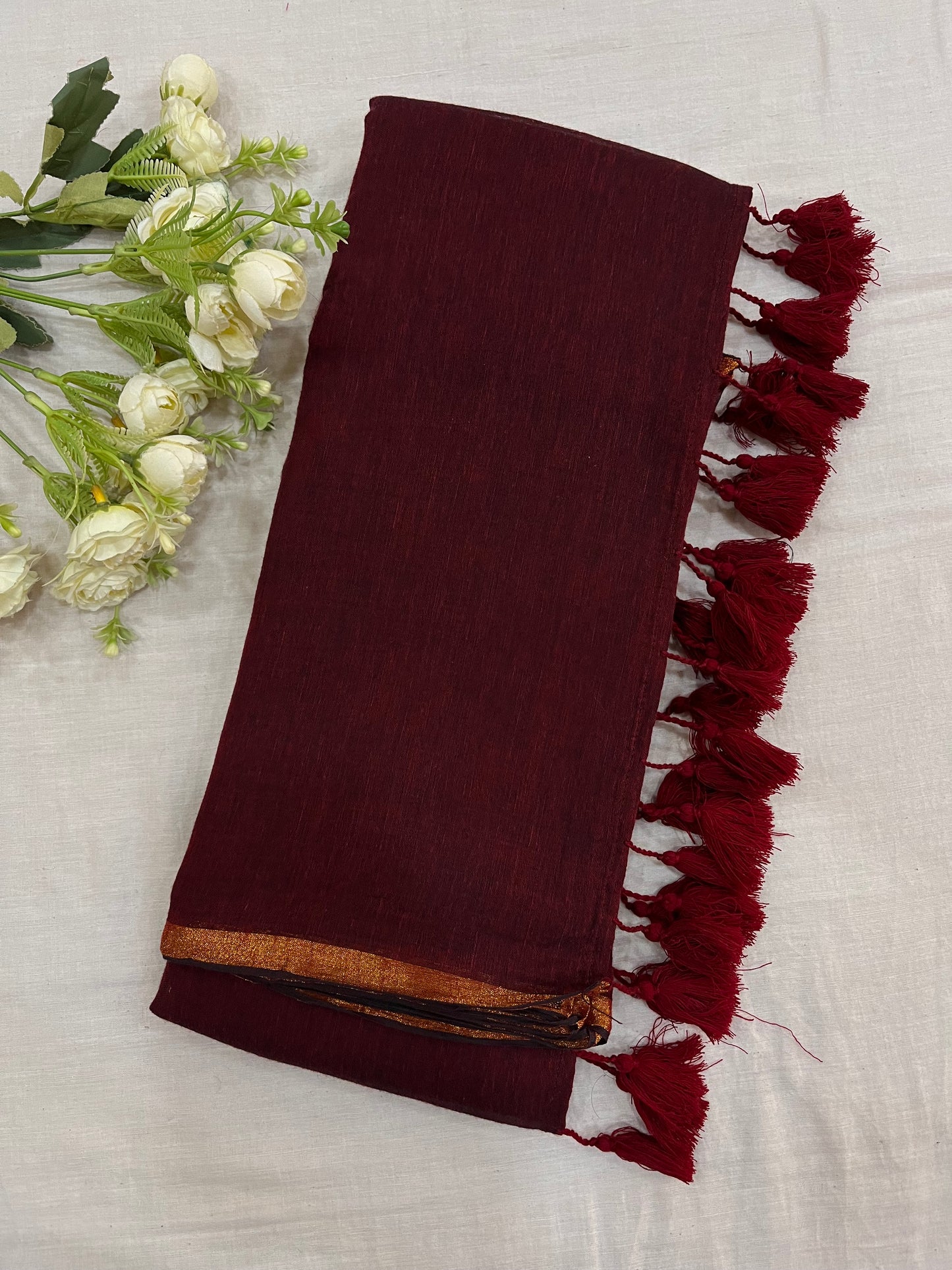 Maroon Copper Zari Border Mulmul Saree