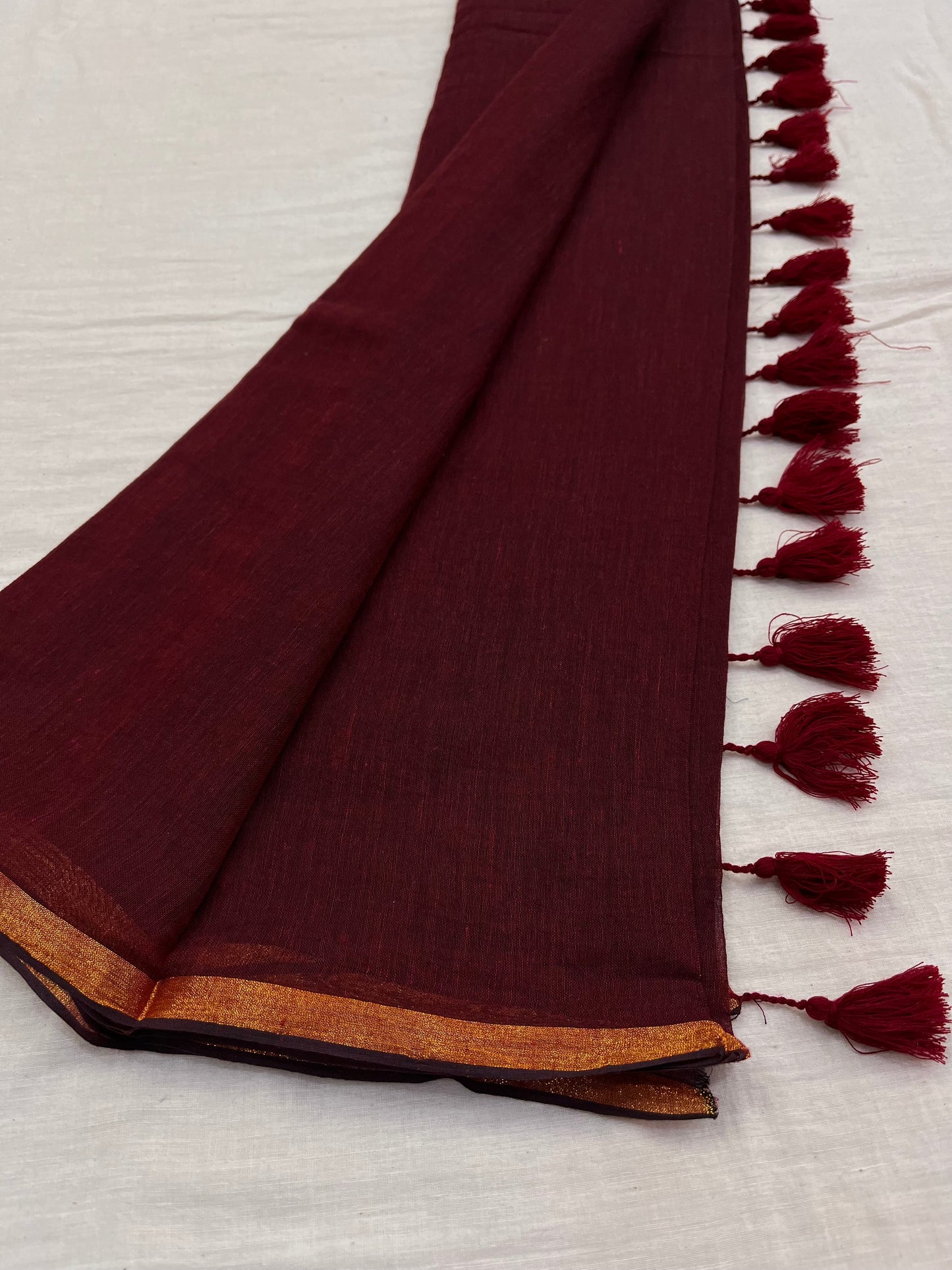 Maroon Copper Zari Border Mulmul Saree