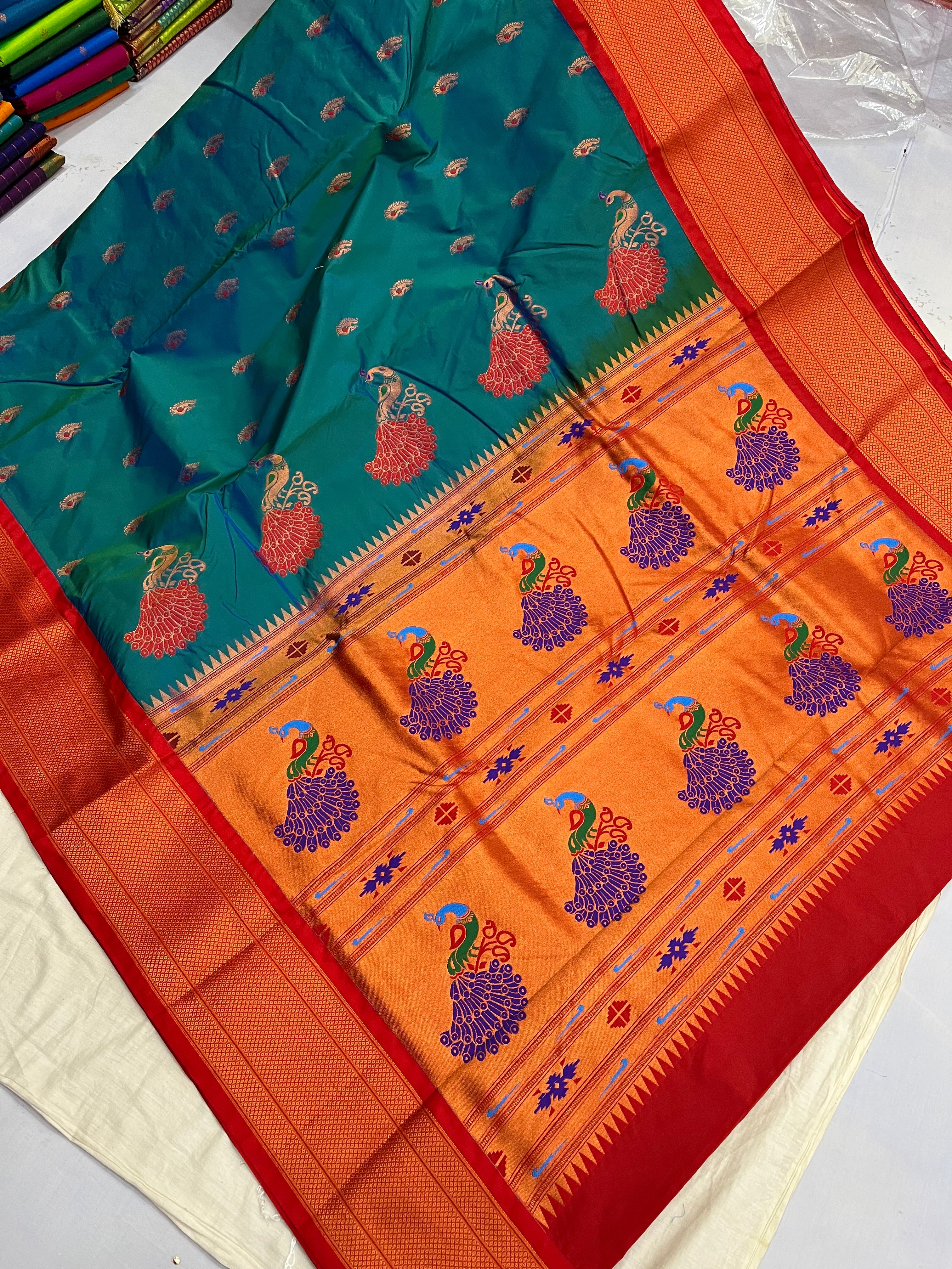 Firoji color paithani silk saree with zari weaving work