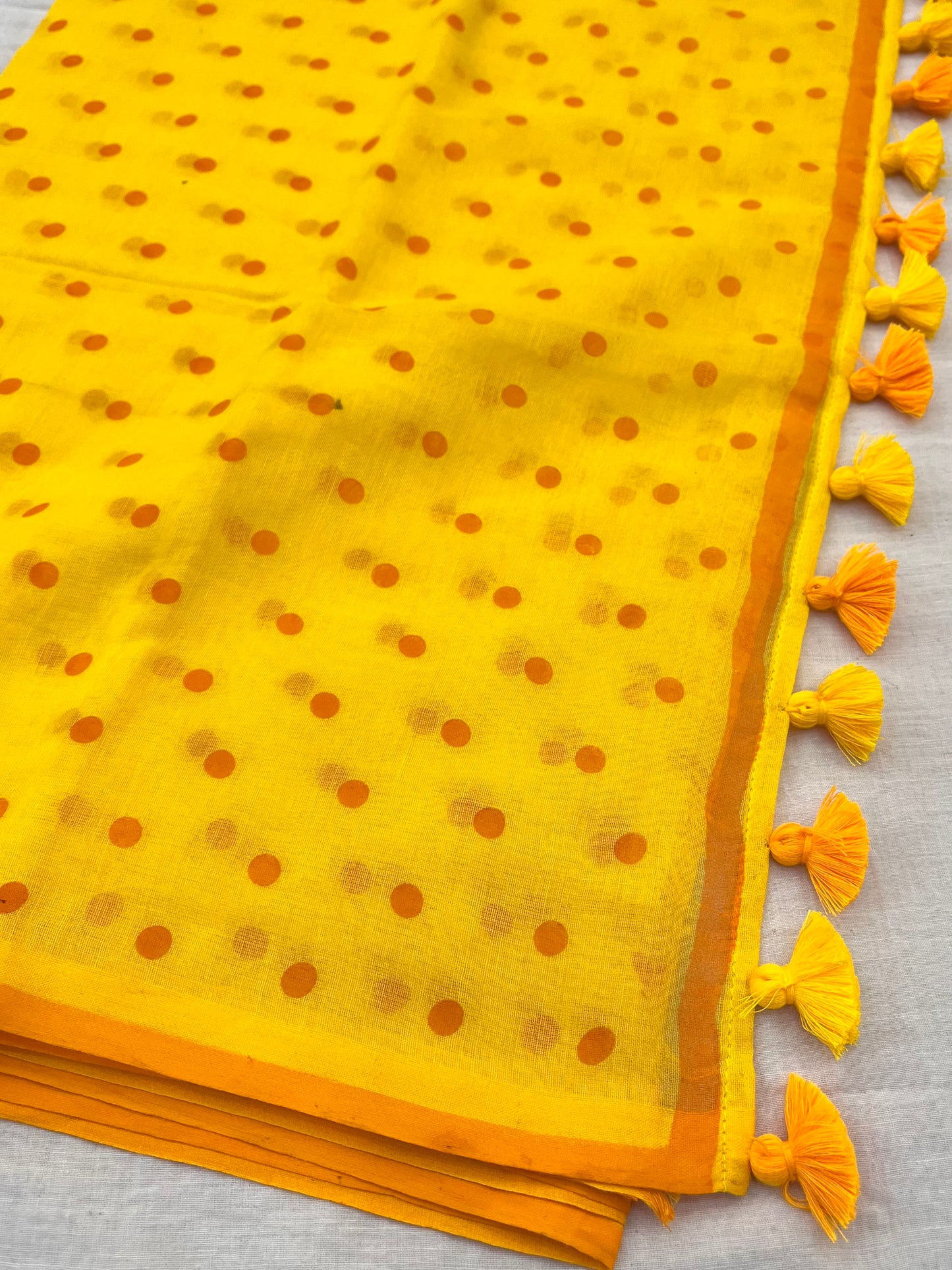 Yellow Orange Dotted Mulmul Saree