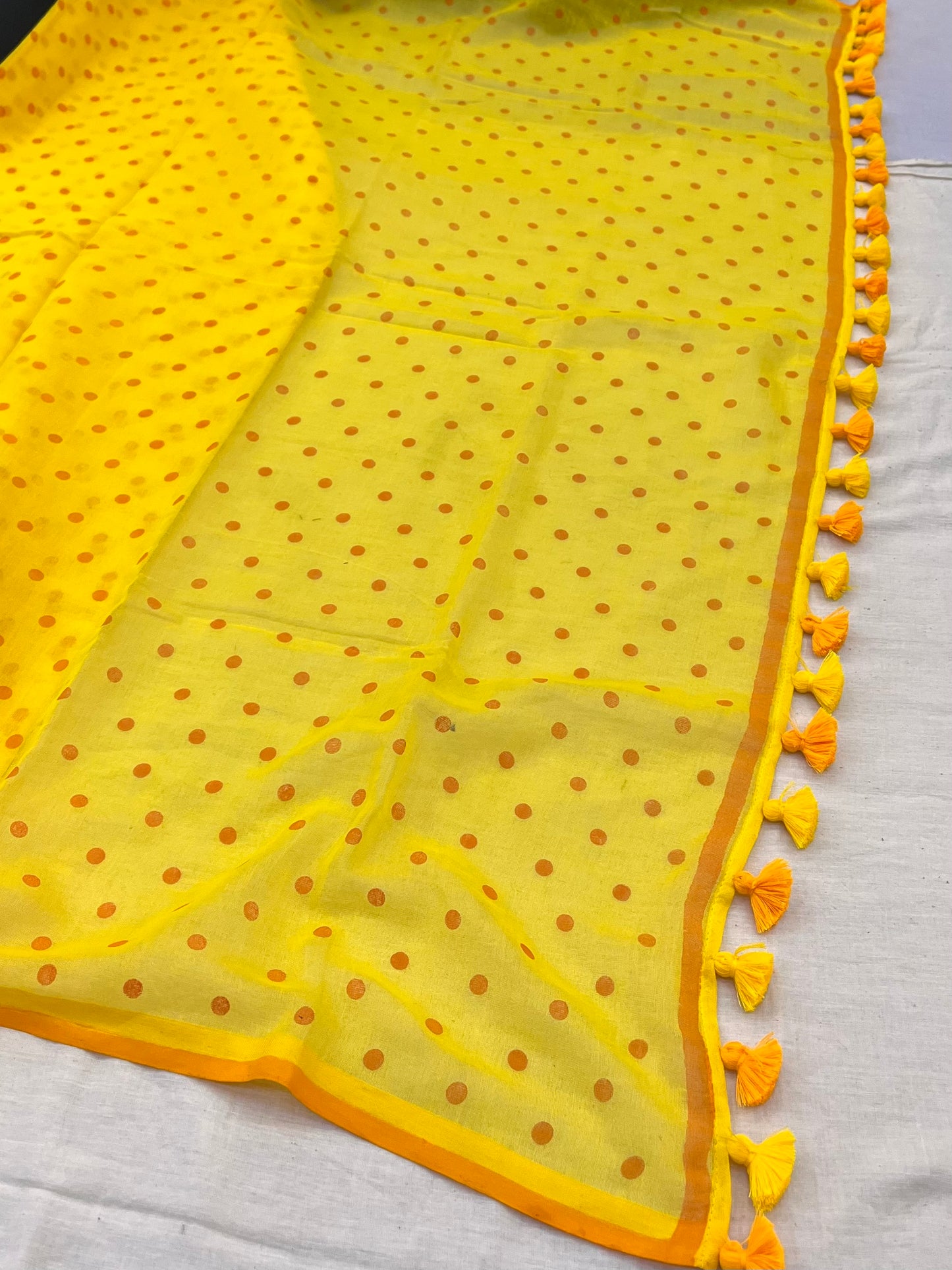 Yellow Orange Dotted Mulmul Saree