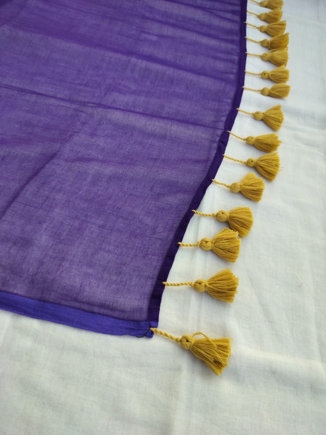 Purple With Golden Tassels Mulmul Saree